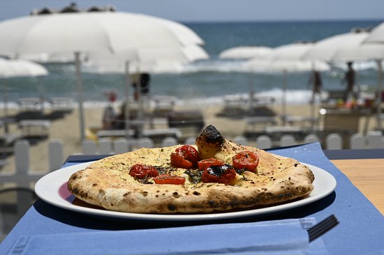 Foto La Risacca - Pizza e cucina sul mare Foto La Risacca - Pizza e cucina sul mare
