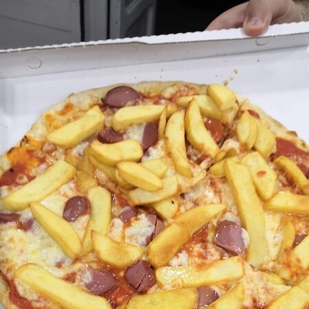 Foto Sesamo e pomodoro. Pizzeria. Foto Sesamo e pomodoro. Pizzeria.