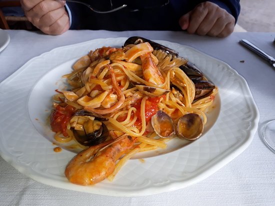 Foto Il Grottino al Porto Foto Il Grottino al Porto